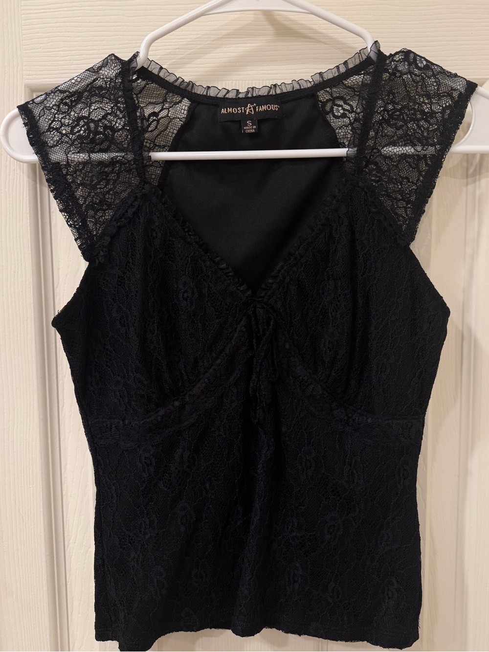 Almost Famous Black Ruffled Neckline Top